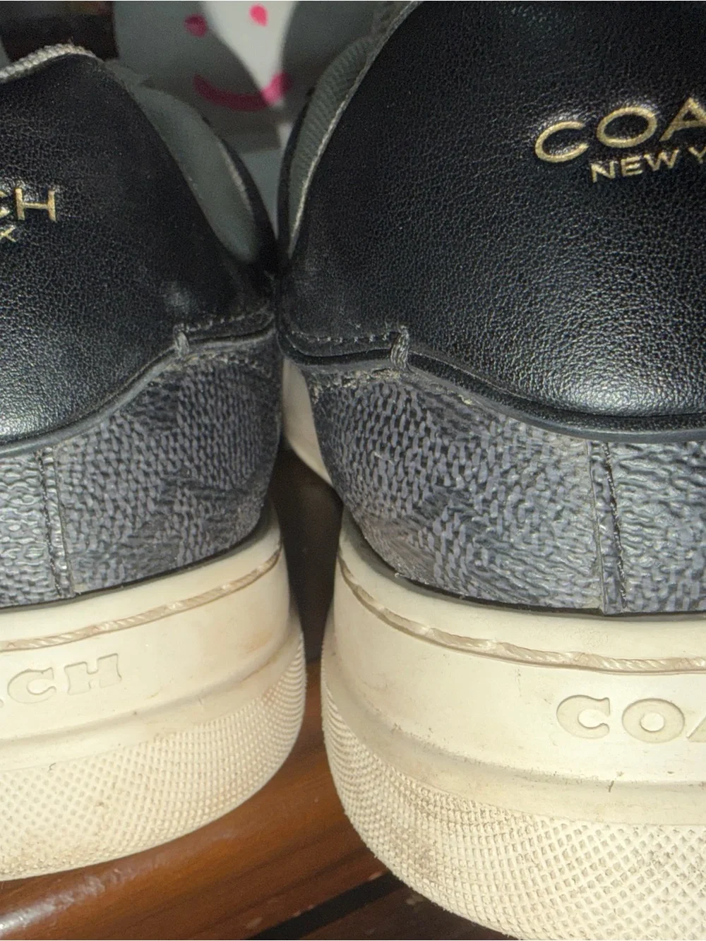 Coach Black Leather Low-Top Sneakers with Cream Soles and Laces